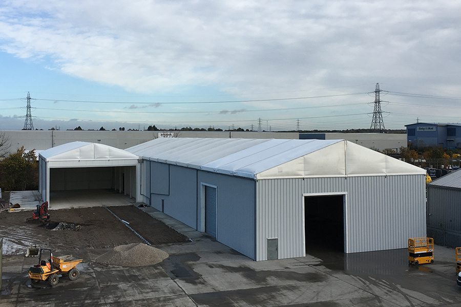 Semi-permanent modular workshop complex offering secure, insulated workspace for manufacturing or storage.