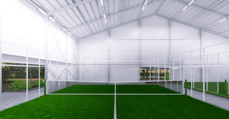 Covered indoor padel facility solution with aluminum structure protecting the court from weather.