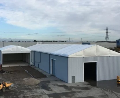 Semi-permanent modular workshop complex offering secure, insulated workspace for manufacturing or storage.