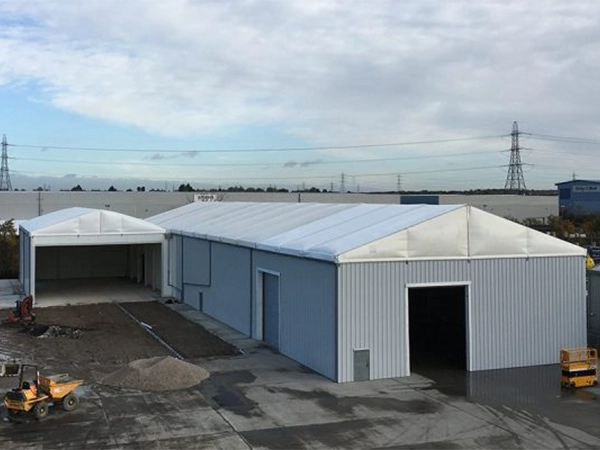 Semi-permanent modular workshop complex offering secure, insulated workspace for manufacturing or storage.
